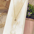 Collar Estrella Asteria sólida dorada con volumen