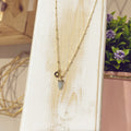 Collar Astra Menta dorado con charm estrella y punta de jade verde